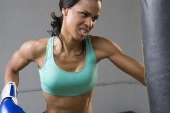 Alternate isometric punch holds with punching bag work to increase your speed and strength.