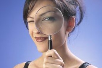 Criminal investigators spend much of their time examining crime scene photos and police reports.