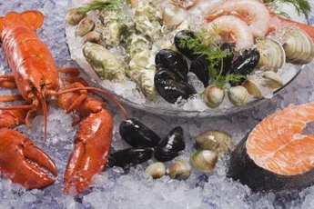 Low-cholesterol seafood includes deepwater fish and some types of shellfish.