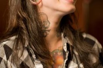 A tattooed woman wears her ink as an accessory.