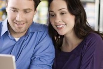 Sit down with your mate to begin to complete your personal budget.