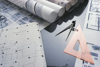 Architects use traditional art supplies and computer technology to build scale models.