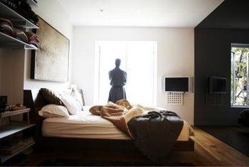 How to Design a Man's Bedroom With Black Furniture | Home ...