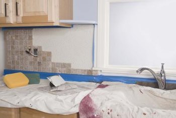 How To Tile Under Cabinets Home Guides Sf Gate How To Tile Under Cabinets Painter S Tape And A Drop Cloth Protect The Countertop From Thinset Grout