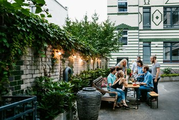 dirt backyard fix around preparing table cheap gathered friends barbecue celebrating foto gettyimages royalty getty res