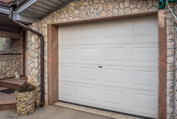 How To Fix A Garage Door That Gets Stuck Halfway Home Guides