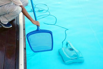 vacuuming inground pool