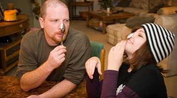 Example: The spoon balanced on her uncle's nose.