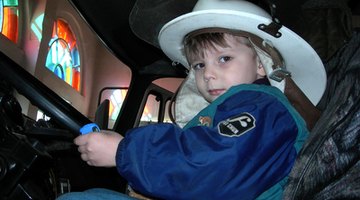 Little boy with a fireman hat on
