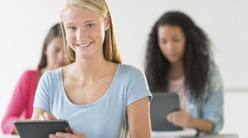 Students working on tablets in classroom