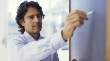 language teacher writing on chalkboard