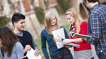 Students talking together on campus.