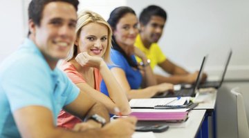 Students smiling in communications class