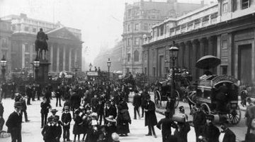 Pedestrians, carriages, bikes and horses fought for the right-of-way in the early 1900s.