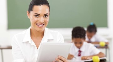 Smiling teacher in classroom