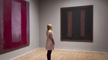 Woman looking at Rothko paintings