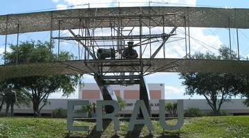 The Wright Flyer statue is the centerpiece of the Daytona Beach campus. The Jack R. Hunt Memorial Library is visible in the background.