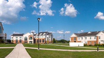 Panoramic shot of Teague Learning Commons, Charles Frey Academic Center, and Peterson Dormitory.