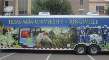 TAMU-Kingsville touring bus parked in front of the Lewis Education and Academic Center at Laredo Community College on April 30, 2012