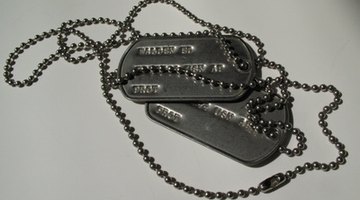 Military dog tags are worn by men and women in the armed services.