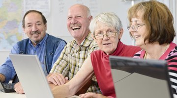 Seniors learning in a computer class