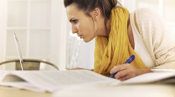 Student with laptop and research