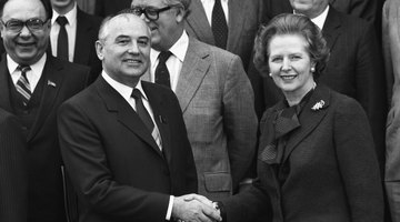 Soviet Politburo member Mikhail Gorbachev shakes hands with British Prime Minister Margaret Thatcher at Chequers on December 16, 1984.