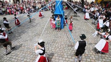 Dancing around the maypole is a cherished German tradition.