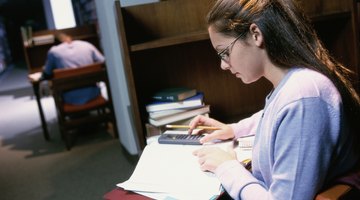 Student working in library.