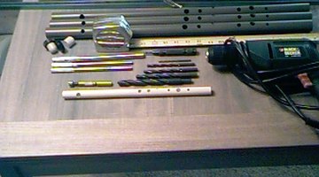 The raw materials and a finished PVC flute