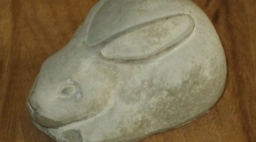 Rabbit sculpture cast in portland cement