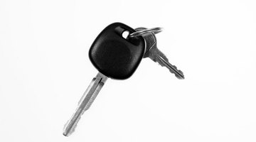 Car salesman holding keys