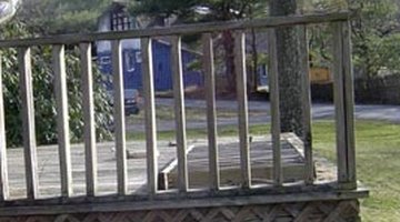 A simple, standard deck railing made from inexpensive wood pickets