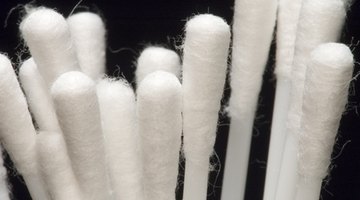 Cotton swabs are the perfect-sized tool to tackle ink stains.