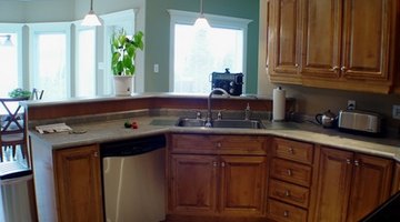 Pendant lights add decor to your kitchen while increasing light in the area.