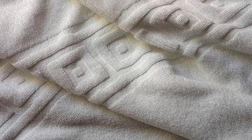 Bath towels are usually plain, except for a stripe of embellishment.