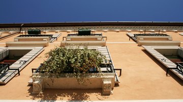 Earth reds are warm, often resembling faded terracotta pots.