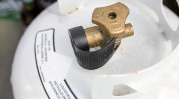 The propane tank shutoff valve screws on and off.
