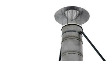 A metal chimney cowl with a "hat."