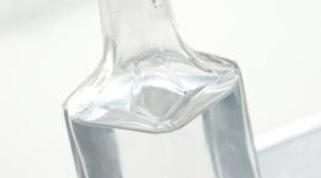 Vinegar breaks down sticky residue on glasses.