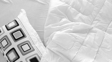 A fluffier comforter requires a couple extra inches to account for the loft of the filling.