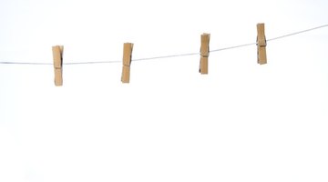 Hang clothing up to check for stains.
