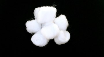 Cotton balls can be used to help repel fleas in your home.