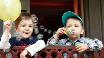 Parallel play involves playing independently but side-by-side.