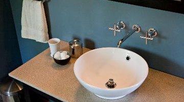 Vessel sinks are reminiscent of old-style wash basins.