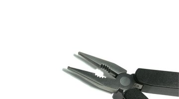 Pull link out through other side with a long nose plier
