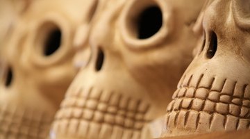 Hand-carved skulls line streets and altars during the Dia de Los Muertos celebration.