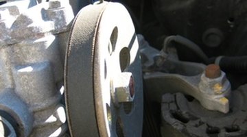 Man fixing truck engine