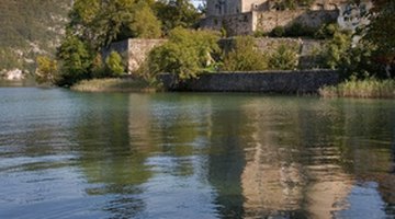 Reflections blend smoothly into the water.