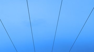The wires should span the enclosure from side to side.
